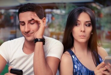 peeking at cell phone 1